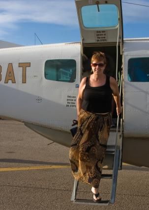 Zanzibar-5553.jpg - Heidi getting off plane in DAR