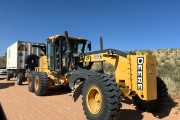 grader and his home, constantly needed to keep road smooth
