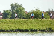 Locals walking the river bank