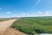 farmland between sculptures