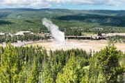 Old Faithful from overlooking hill