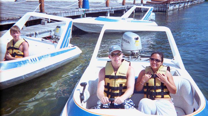 cancun1-23.jpg - Greg and Lisa in their speed boat.....