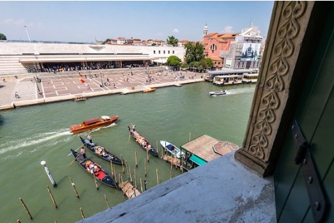 Grand Canal in Venice with boats passing historic buildings